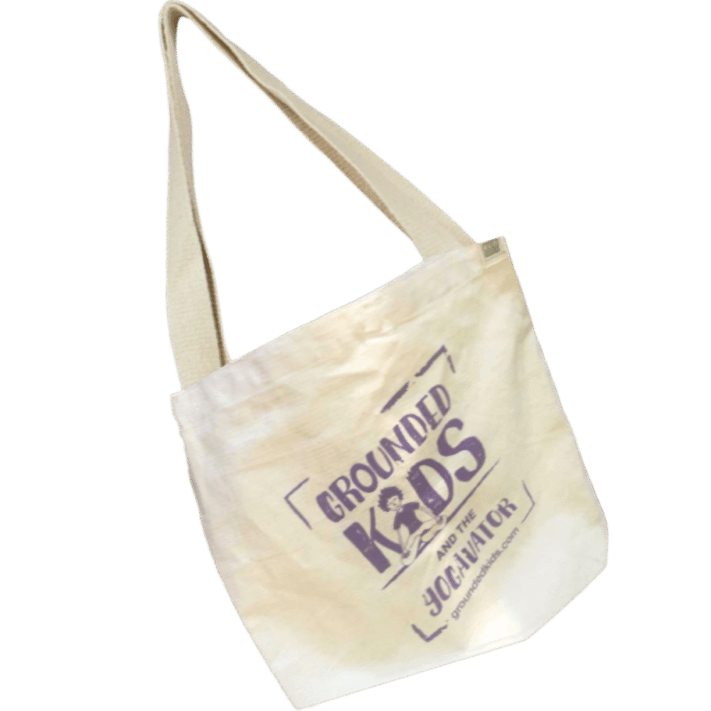 Grounded Kids Yoga branded canvas tote bag made by EcoBags, featuring sturdy handles and natural cotton fabric for carrying yoga supplies, teaching materials, or everyday items