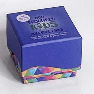 Front view of the Mini Pose Cards box closed, showing the Grounded Kids Yoga logo and compact packaging designed for easy storage and classroom use