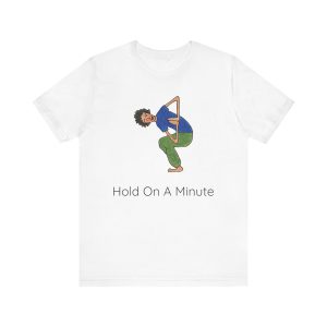 White unisex yoga t-shirt with a crouching child in a yoga pose and Hold On A Minute on the front