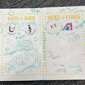 Grounded Kids sticker book open to the Twist and Shine and Notes and Extras pages, filled in by a child with stickers and handwritten words like be energetic, be powerful and don't be discouraged
